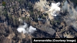 Explosions of Russian military vehicles filmed by a drone from Aerorozvidka, a group of operators that work closely with the Ukrainian military.