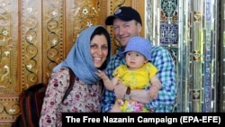 A file photo of British-Iranian woman Nazanin Zaghari-Ratcliffe with her husband Richard Ratcliffe and daughter Gabriella.