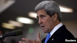 U.S. Secretary of State John Kerry speaks at a news conference in Tel Aviv on May 24.