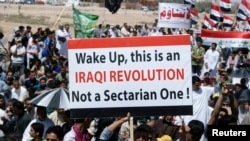 Sunni Muslims take part in a demonstration against Prime Minister Nuri al-Maliki in Fallujah on April 5.