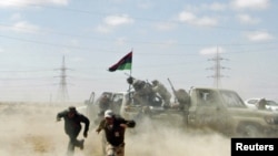 A UN report on the Libya conflict says war crimes have been committed on both sides. 