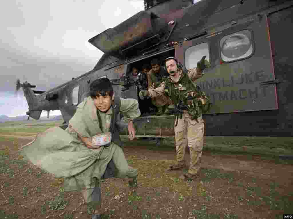 ISAF air-rescue operations in the flooded Deh Rawod District near Afghanistan&#39;s Helmand-Oruzgan provincial border in March 2007.