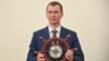 The newly appointed governor of the Khabarovsk region, Mikhail Degtyaryov, attends his introduction ceremony at the Khabarovsk regional government on July 21.