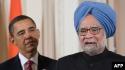 U.S. President Barack Obama and Indian Prime Minister Manmohan Singh speak to the press in Washington.