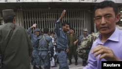 Policemen were dispatched to try and keep order at a branch of Kabul Bank in the midst of September's run on the bank.