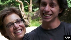 Joshua Fattal (right) with his mother, Laura Fattal, in an undated family photograph