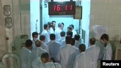 In a still image from video, a group of scientists is seen near the control room area at the Tehran Research Reactor in February.