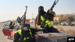 Armed Sahwa militiamen opposed to Al-Qaeda (file photo)