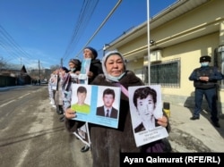 Kazakhs with relatives missing in Xinjiang Province take part in a protest near the Chinese Consulate in Almaty in March 2021.