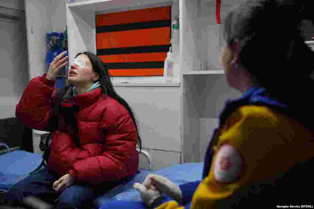 Protesters are treated inside an ambulance amid heavy police use of tear gas on November 29.&nbsp;