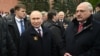 Russian President Vladimir Putin (left) and Belarusian strongman Alyaksandr Lukashenka attend Victory Day events in Moscow on May 9. 