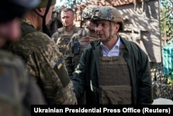 Ukrainian President Volodymyr Zelenskiy visits army positions in the Donetsk region on October 14.