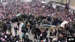 A video grab shows the funeral of people killed in Maaret al-Noman in the flashpoint northern Idlib province.