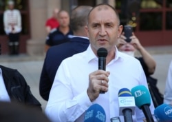 Bulgarian President Rumen Radev speaks at a protest rally in Sofia on July 10.