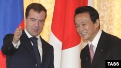 President Dmitry Medvedev (left) with Japanese Prime Minister Taro Aso met on Sakhalin on February 18.