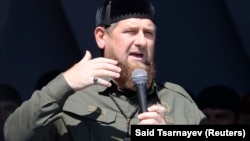 Chechen leader Ramzan Kadyrov delivers a speech during a rally in Grozny in support of Burma's Rohingya Muslim minority on September 4.