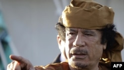 There have been conflicting reports as to how Muammar Qaddafi met his end. 