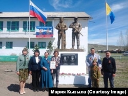 A monument in the Siberian village of Kara-Khaak to brothers Kara-Sal and Avyral Belek who were both killed in Ukraine