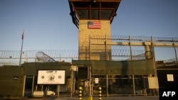 The front gate of "Camp Six" detention facility of the Joint Detention Group at the U.S. Naval Station in Guantanamo Bay in January 2012