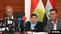 Kurdistan Alliance members discuss leaving the coalition government.