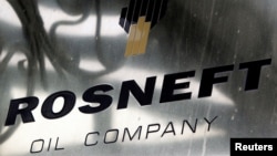 FILE PHOTO: A logo of Russian state oil firm Rosneft is seen at its office in Moscow