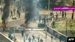 A TV video grab shows clashes in the flashpoint town of Daraa in April.