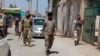 Afghan National Army soldiers patrol during fighting between Taliban and Afghan security forces in inthe noreastern city of Kunduz on June 24.