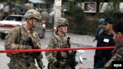 U.S. soldiers secure the scene of a bomb explosion in Kabul in August.