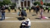 Protesters demonstrate outside parliament in Sofia on July 21, where daily protests have gradually dwindled in number.