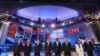 U.S. Republican presidential candidates stand on stage prior to the start of their debate on national security at the Daughters of the American Revolution Constitution Hall in Washington, D.C., on November 22.