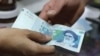 Ahmadinejad Blames West For Rial Plunge