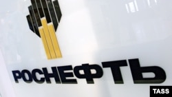 A statement from Rosneft said the company was "deeply shocked" by the "Kommersant" article and might sue the newspaper.