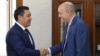 RFE/RL President Jamie Fly (right) meets with Kyrgyz President Sadyr Japarov in Bishkek in September 2021.