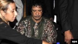 Muammar Qaddafi reportedly relies on a team of Ukrainian nurses