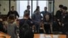 Seven Russian Activists Given 'Horrific' Sentences On Terror Charges