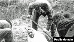 An Iranian woman being prepared for a stoning in the 1980s.