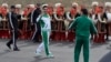 Turkmen President Gurbanguly Berdymukhammedov (center) waves to the media during the starting ceremony of a 500-day nationwide horse race at the historical site of Nisa just outside Ashgabat on May 5, 2016, in preparation for the 2017 Asian Indoor and Martial Arts Games.