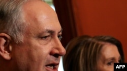 Israeli Prime Minister Binyamin Netanyahu talks to reporters before a meeting earlier in the day with Congressional leaders including House Speaker Nancy Pelosi (pictured). Obama and Netanyahu did not appear together after their meeting.