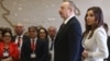 Azerbaijani President Ilham Aliyev and his wife Mehriban Aliyev arrive to vote at a Baku polling station on April 11. 