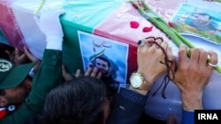 Televised images of the funerals of Iranian casualties of Syria's four-year conflict have shown masses of their countrymen marching in procession on main streets, truck-mounted loudspeakers trained on the huge crowds, and uniformed soldiers and plainclothes mourners weeping and throwing themselves on flag-draped caskets.