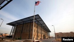 A U.S. flag flies in front of the Annex I building inside the compound of the U.S. Embassy in Baghdad. (file photo)