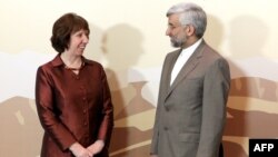 EU foreign policy chief Catherine Ashton and Iran's top nuclear negotiator Said Jalili at the Iran talks in Almaty.