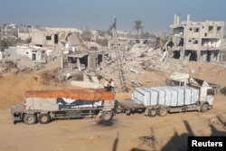 Trucks carrying aid arrive in Gaza on February 4.