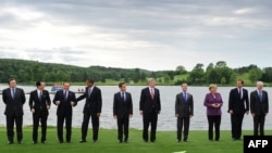 Heads of state and government pose for the family picture at the G8 summit in Huntsville, Ontario on the first day of the gathering.