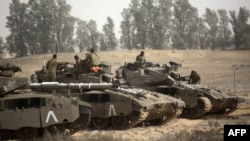 Israeli tanks stationed at the Israeli-Gaza Strip border on November 16