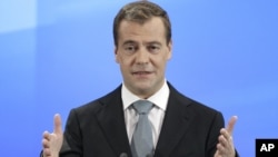 Russian President Dmitry Medvedev speaks during a press conference at a bussiness school in Skolkovo, outside Moscow, on May 18.